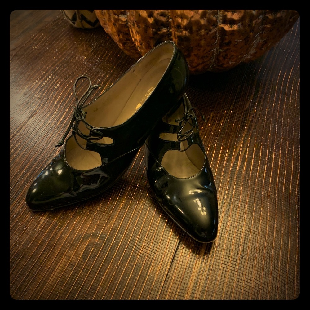 Salvatore Ferragamo patent leather Mary Janes.